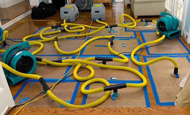 Professional Flood Damage Restoration technician working in Kokomo, MS